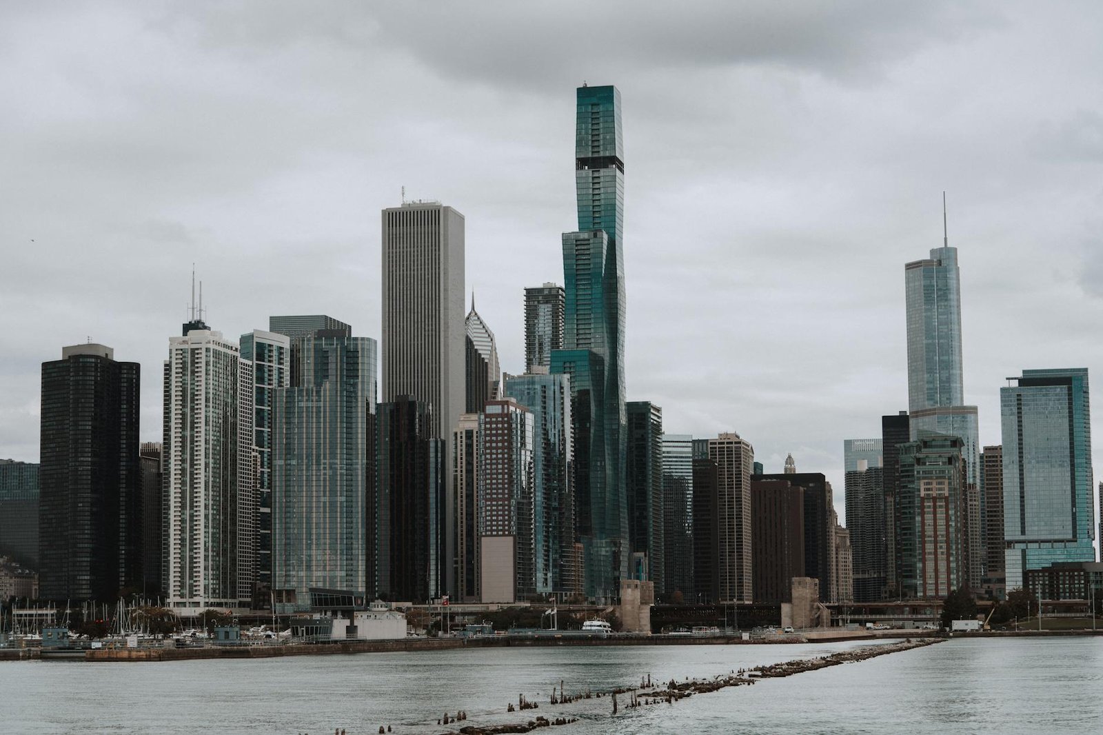 Captivating view of Chicago's modern skyline featuring iconic skyscrapers under a cloudy sky.