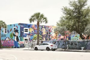 Wall Street sube: ¿Cómo afecta a las inversiones en Miami?
