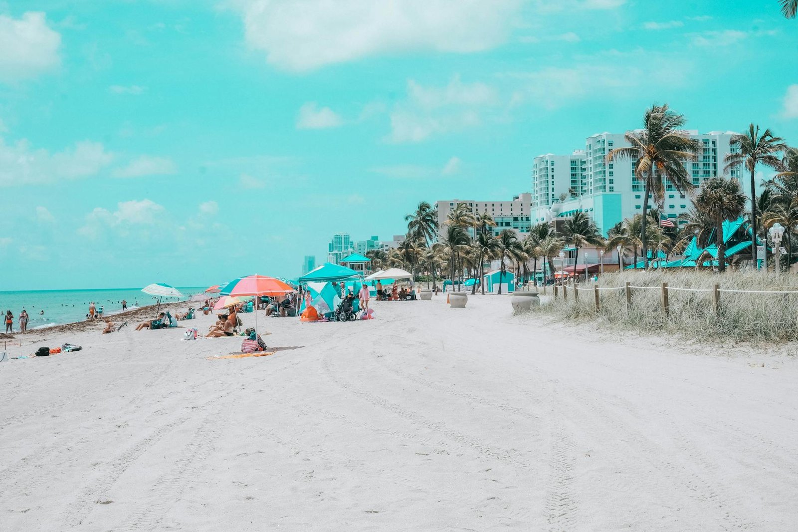 Relaxing seaside scene with colorful umbrellas on a sunny beach day. Perfect vacation spot.